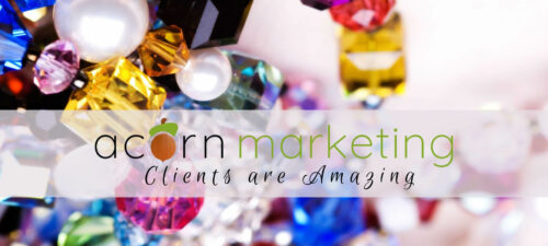 Jewels on White Background with wording Acorn Marketing Clients are Amazing