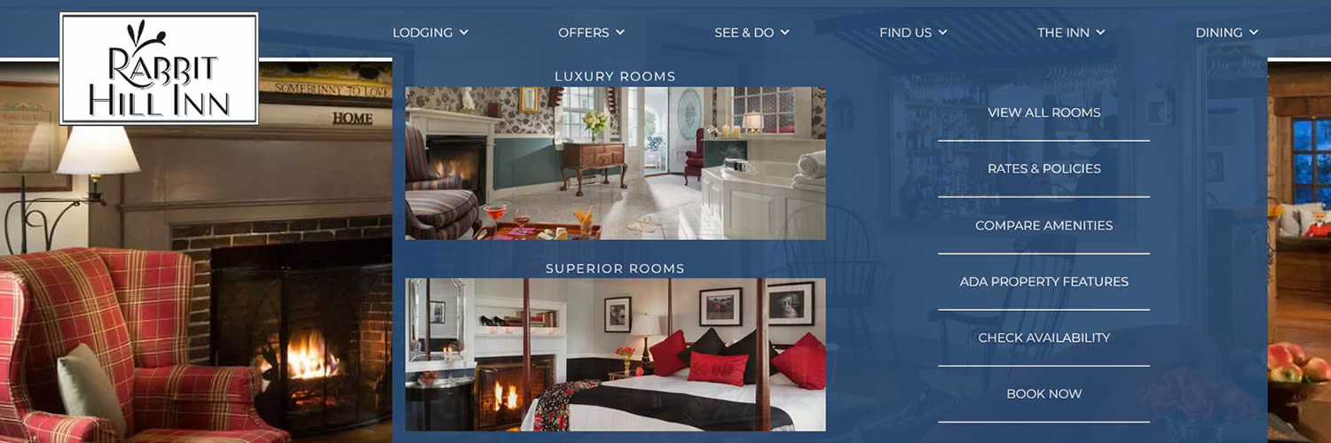 blue website rabbit hill drop down navigation with room photos