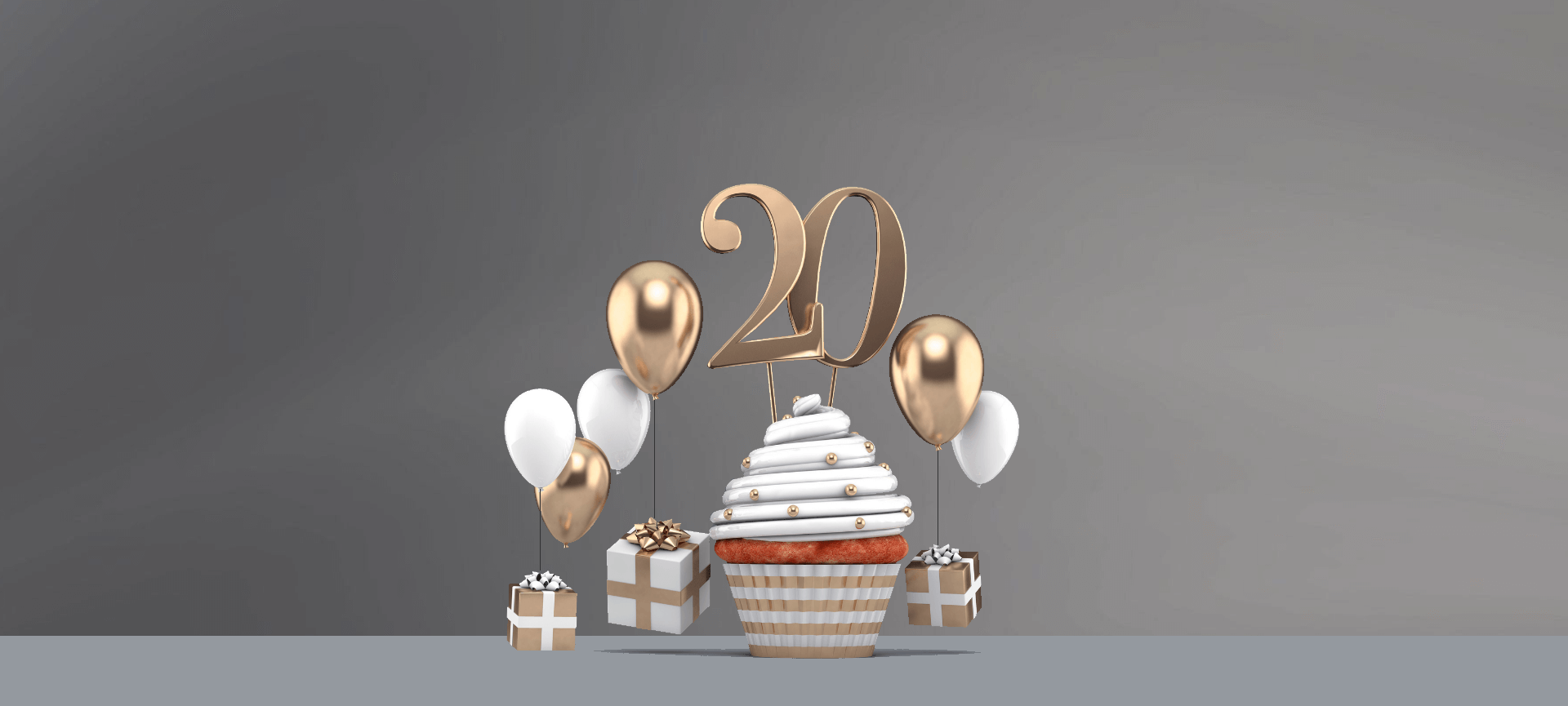 20th Anniversary cupcake with balloons and gifts