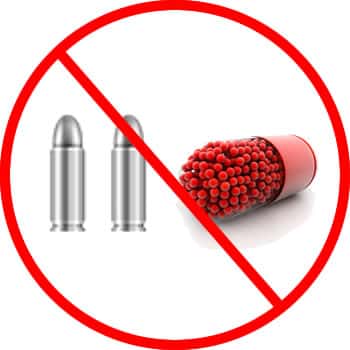 bullets and red pill capsule with slash through it