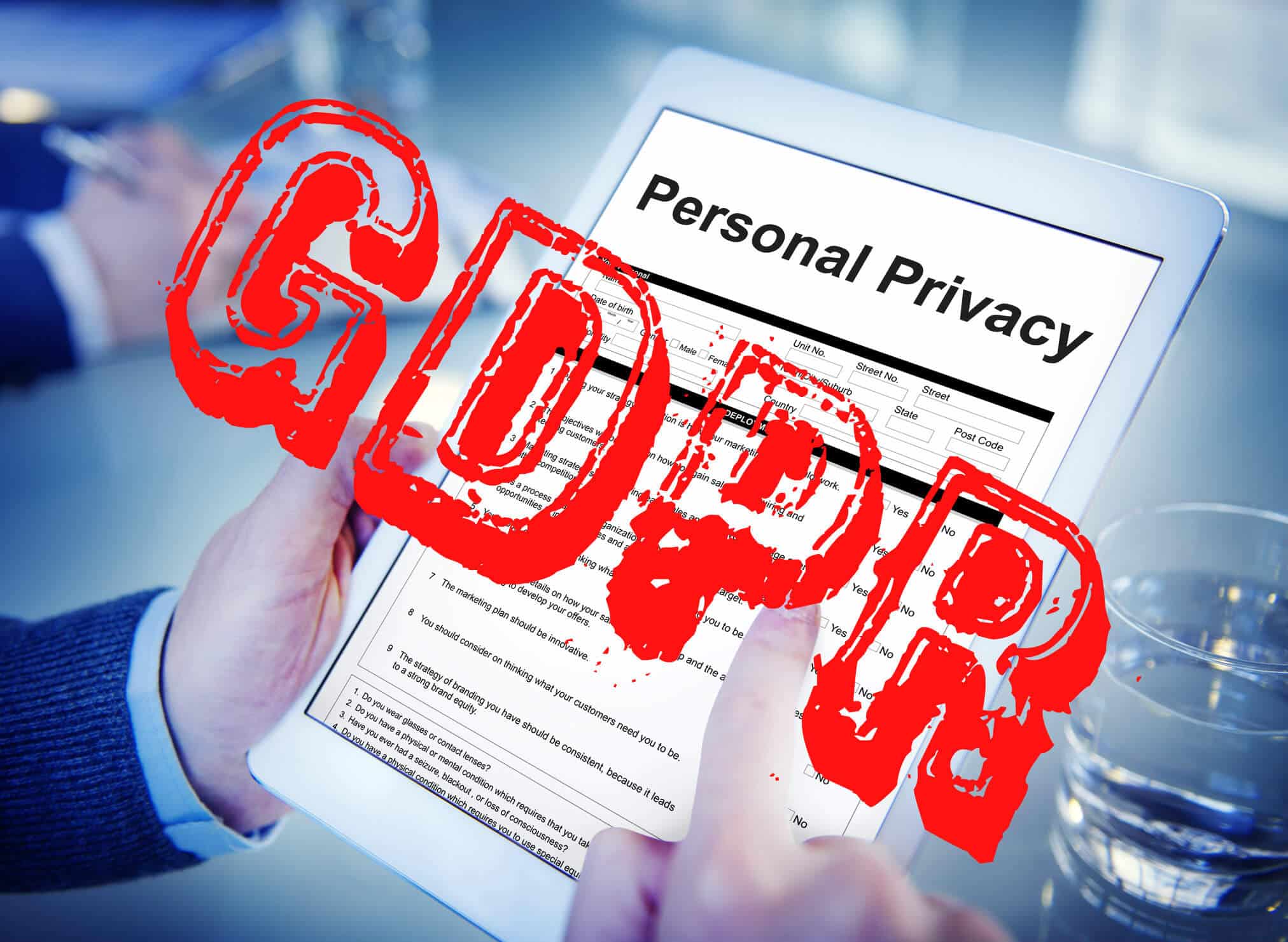 Privac form on a tablet computer, with the initials GDPR over it in red text 